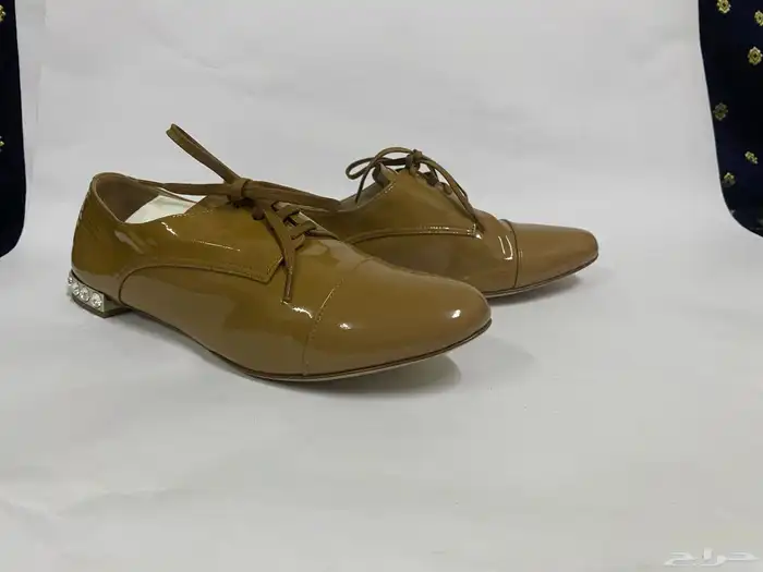 حذاء ماركة ميو ميو miu miu شبه جديد اصلي جلد لميع مقاس 37 8