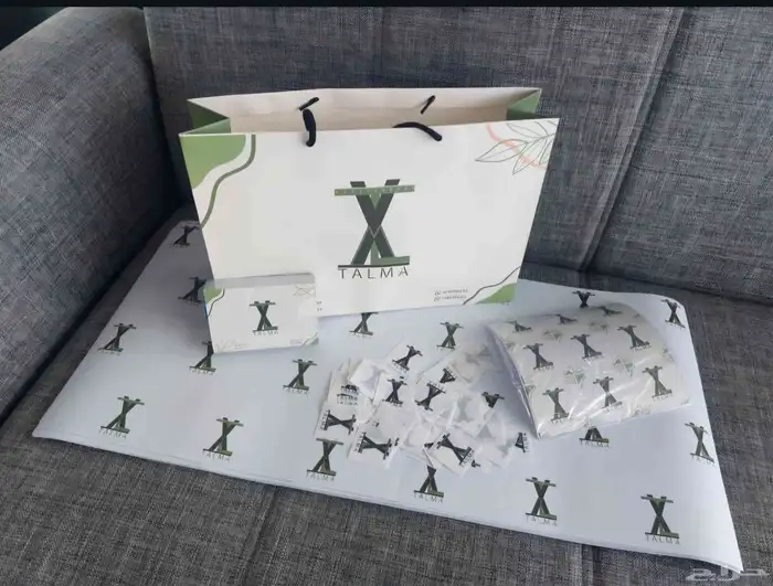 طباعة بكج عبايات بوكسات عباية كيس عباية لوقو قماش ملصقات 7