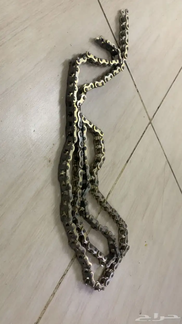 جنزير دباب يجي على مقاس سيكل 20 بس ناقص له مسمار وانتهينا 1