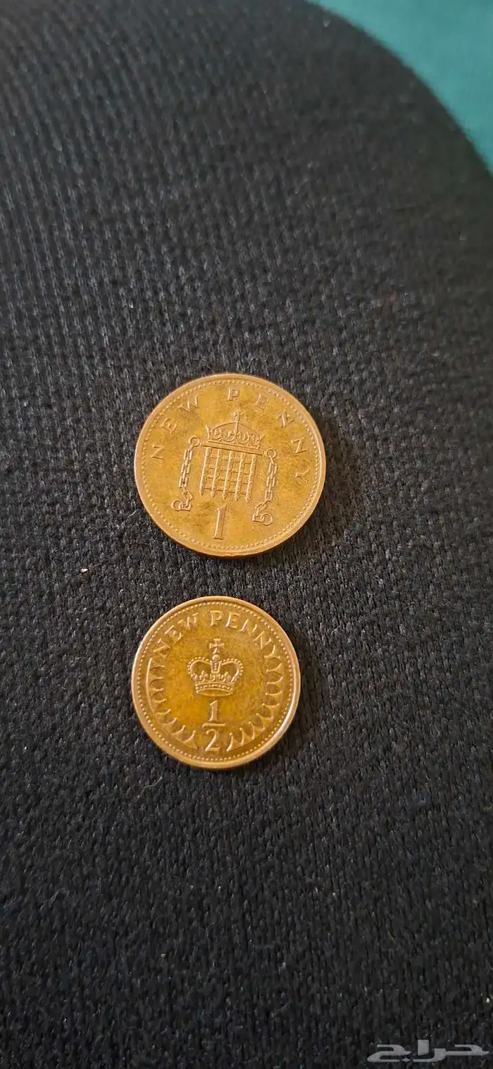 عملة بريطانية من 1971 الملكة اليزابيث 2 و عملة امريكية 1961 3
