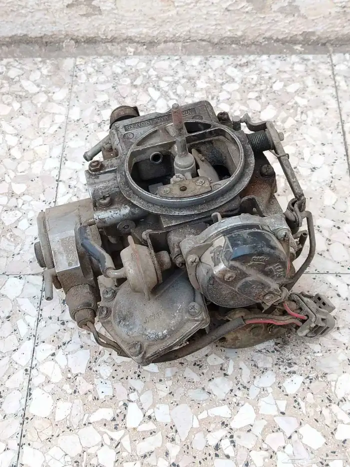 كربريتر سيدريك نيسان وكمبروسر وطبلون وقطع اخري 4