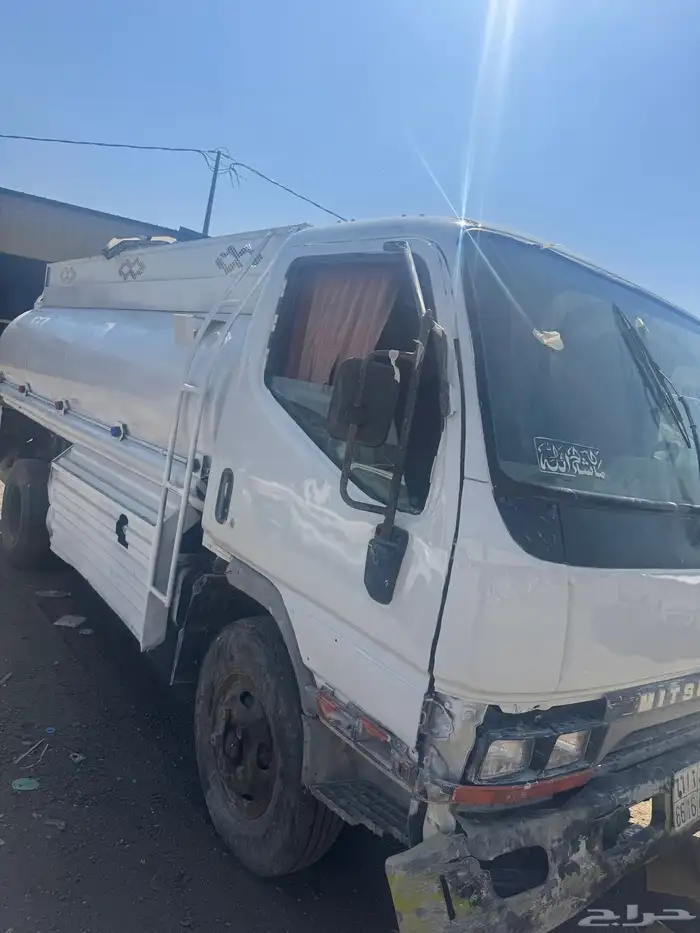 اعرض لكم دينا ميتسوبيشي 2002 وايت 2