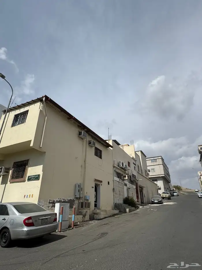 بيت شارعين شقتين ومحلات 2