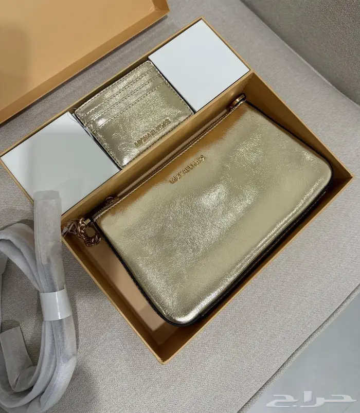 شنطة مايكل كورس ذهبي   أصلية 0