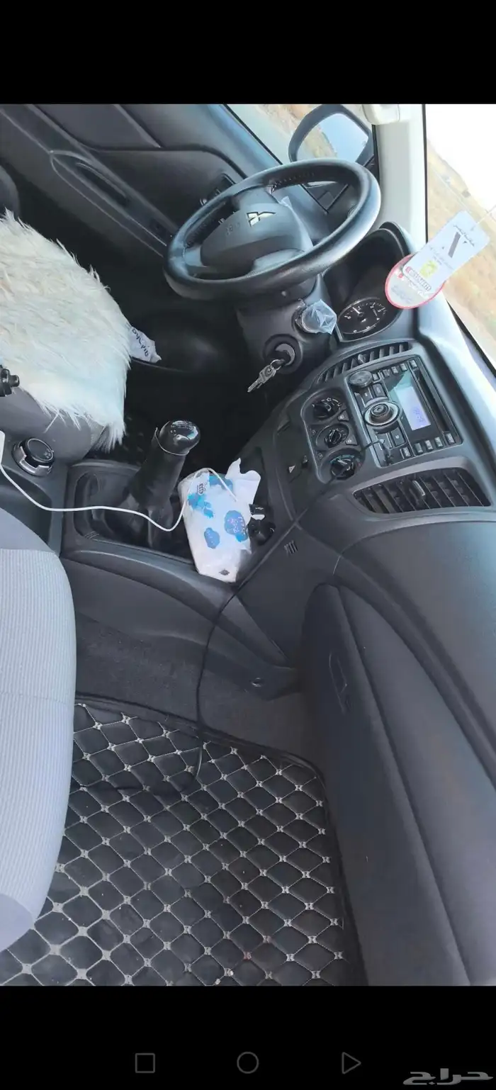 موستبيشي L200 4