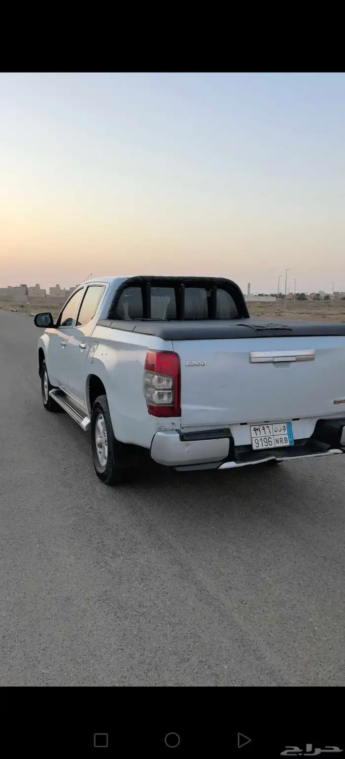موستبيشي L200 1