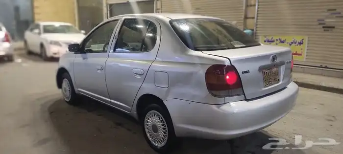 2003 Toyota Echo with a mileage of 348000 and a manual trans 3