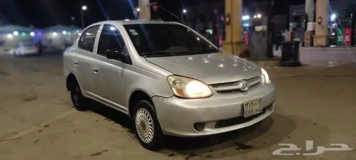 2003 Toyota Echo with a mileage of 348000 and a manual trans 2