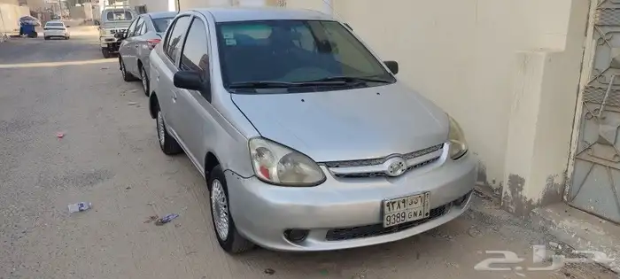 2003 Toyota Echo with a mileage of 348000 and a manual trans 8