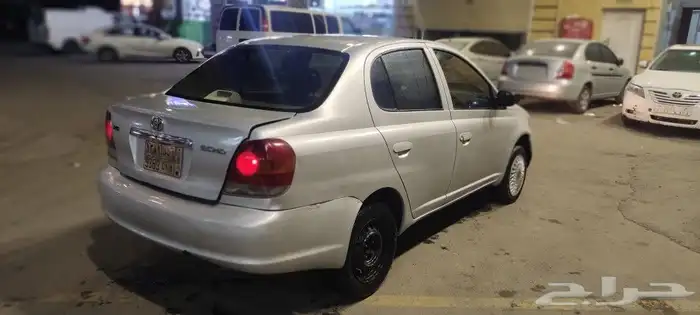 2003 Toyota Echo with a mileage of 348000 and a manual trans 1