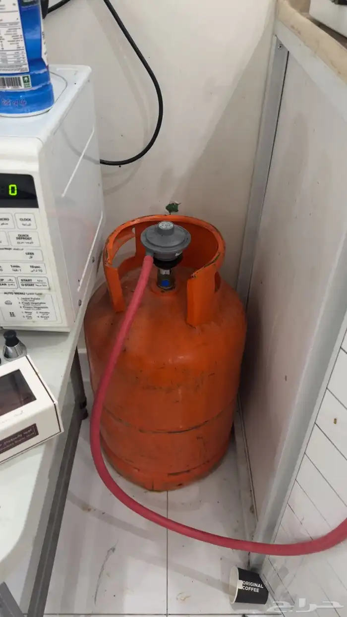 اسطوانة غاز مع الوصلة (الساعة) 0