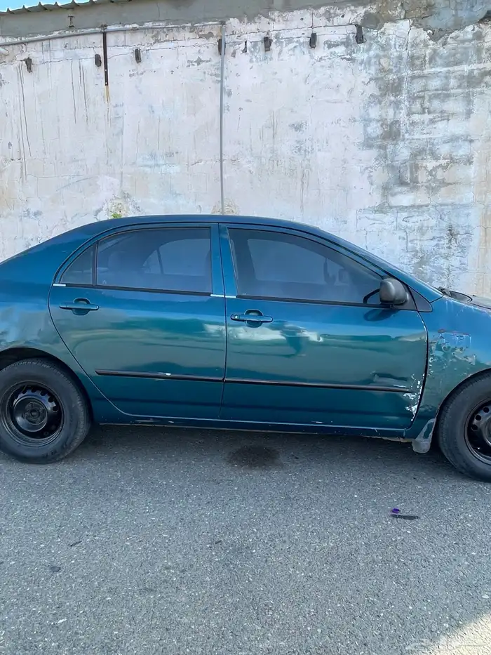 للبيع كورولا 2003 12