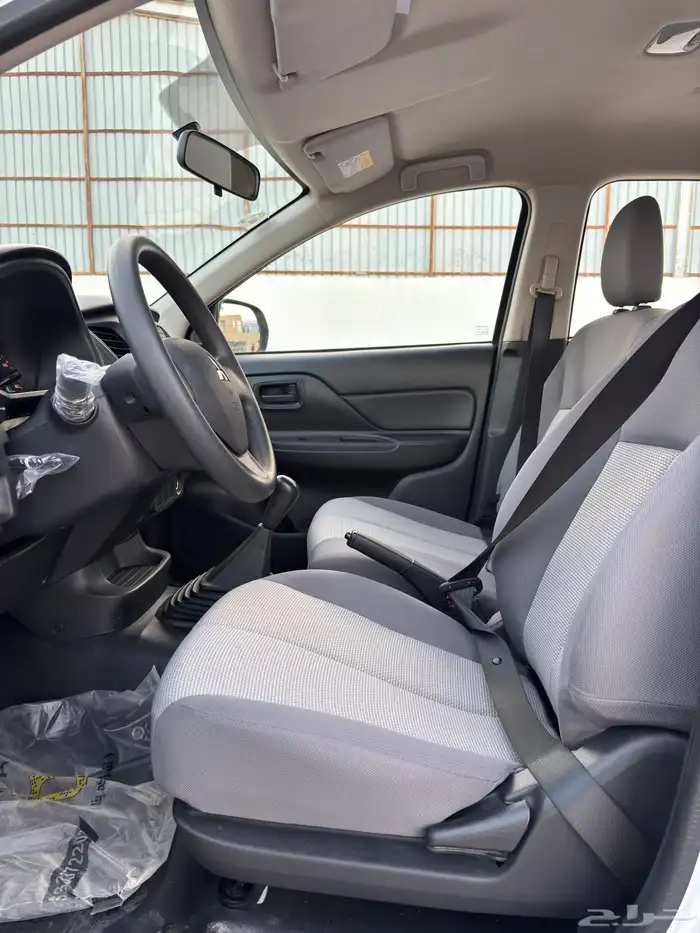 ميتسوبيشي 2023 L200 ديزل غمارتين بدي وكاله ممشى 98 الف 9