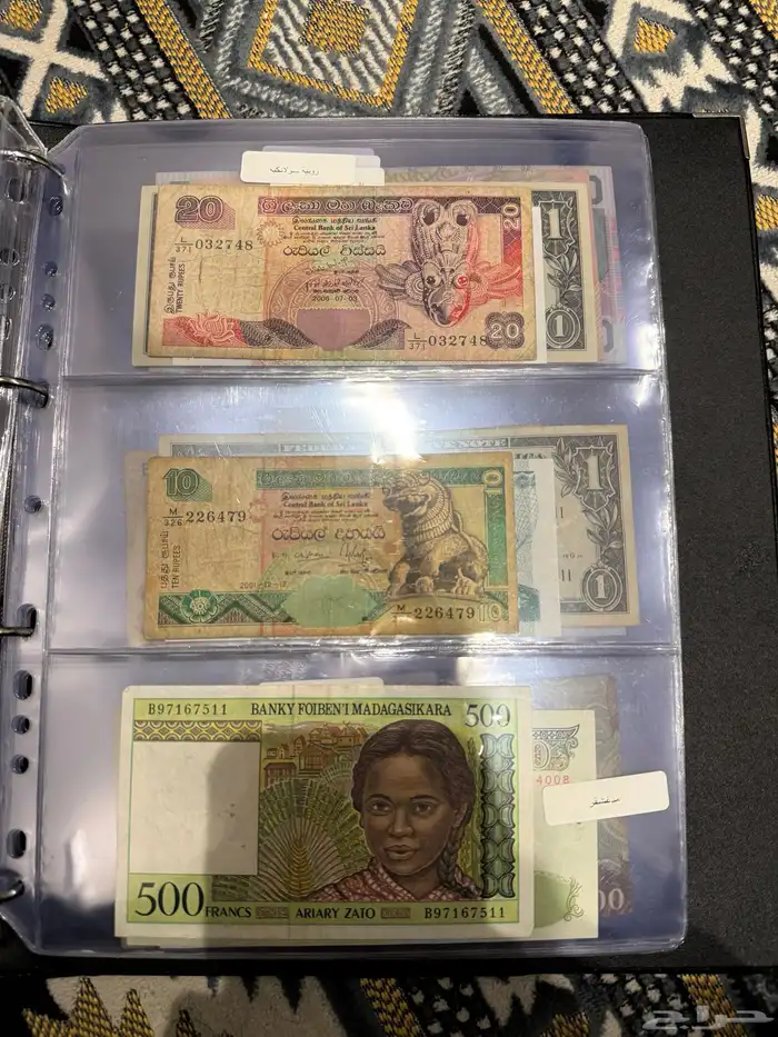 عملات اجنبيه وفلوس سعوديه قديمه 35