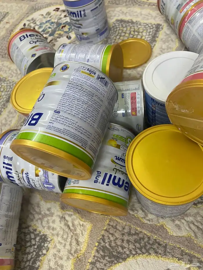 علب حليب معدنية فاضية 4