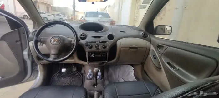 2003 Toyota Echo with a mileage of 348000 and a manual trans 4