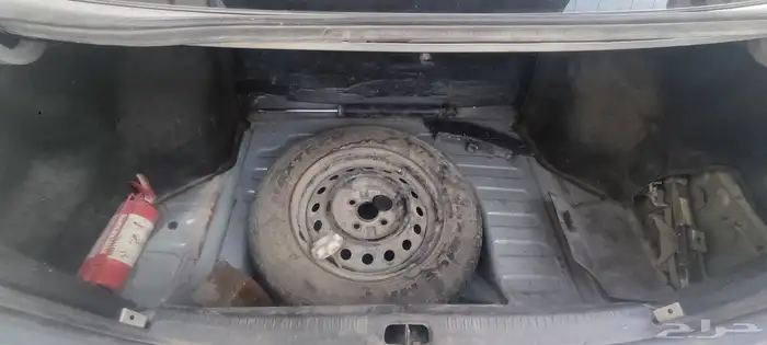 2003 Toyota Echo with a mileage of 348000 and a manual trans 9