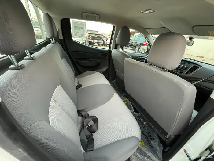 ميتسوبيشي 2023 L200 ديزل غمارتين بدي وكاله ممشى 98 الف 14