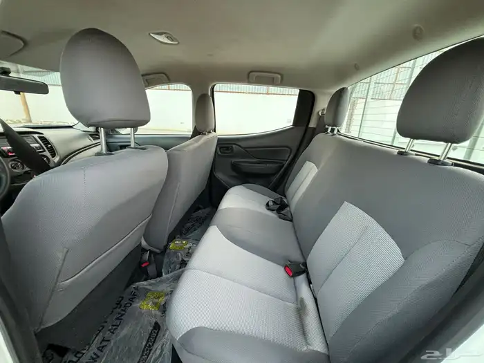 ميتسوبيشي 2023 L200 ديزل غمارتين بدي وكاله ممشى 98 الف 12