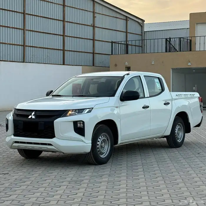 ميتسوبيشي 2023 L200 ديزل غمارتين بدي وكاله ممشى 98 الف 2
