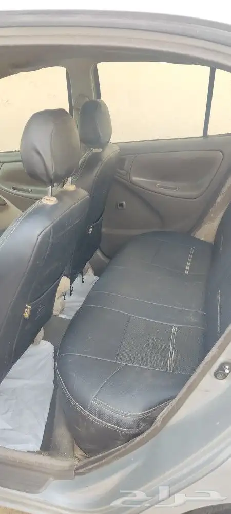 2003 Toyota Echo with a mileage of 348000 and a manual trans 5