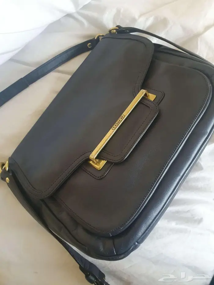 شنطة من كوتش أصلية بحالة ممتازة 2