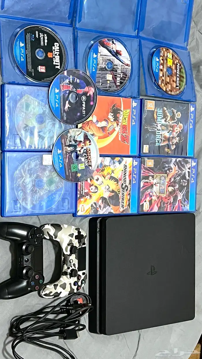 PlayStation 4 slim in excellent condition with 11 cds new 0