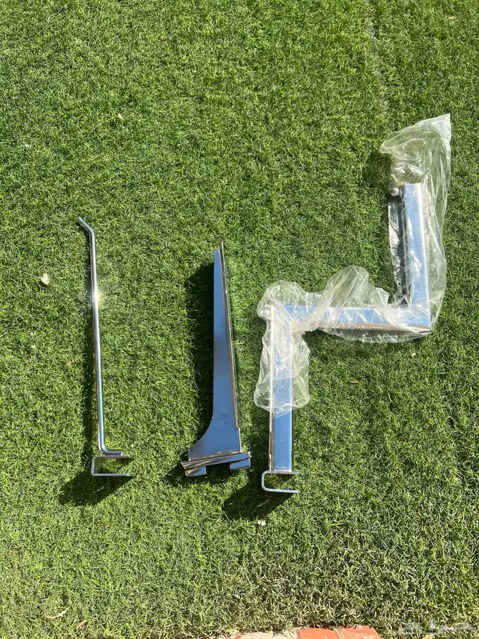 مجموعه من معاليق محلات ورفوف جديده 0