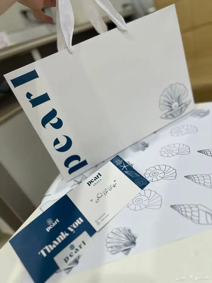 طباعة بكج تغليف عبايات اكياس ليبل قماش تاقات ورق تغليف 5