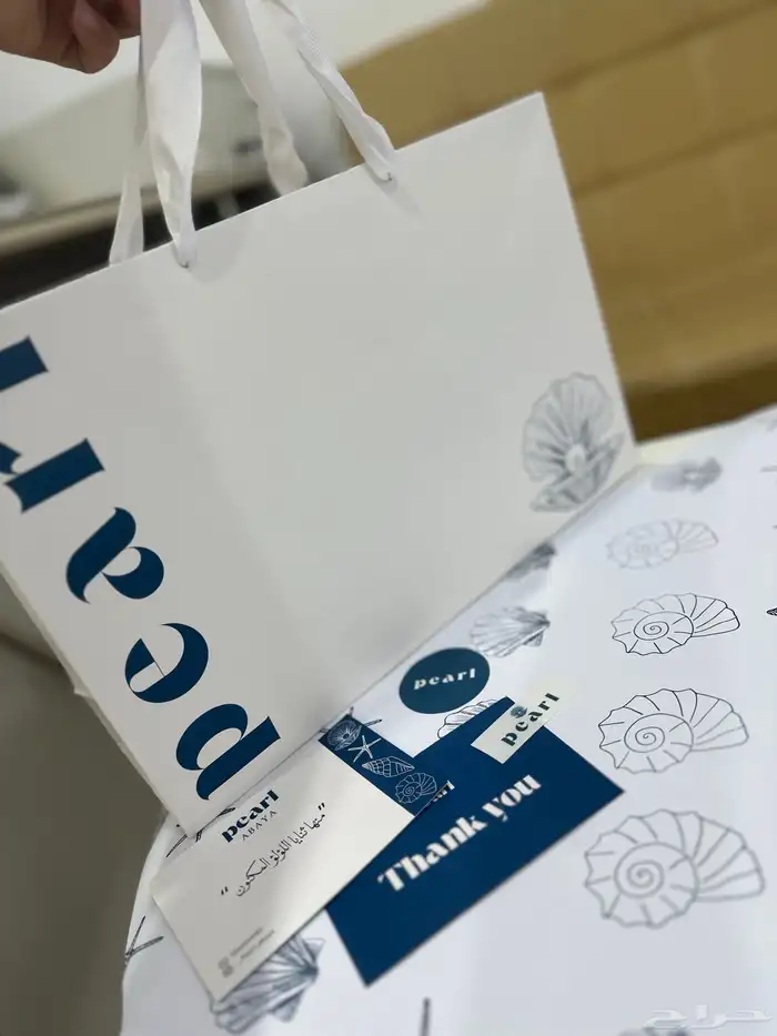 طباعة بكج تغليف عبايات اكياس ليبل قماش تاقات ورق تغليف 8