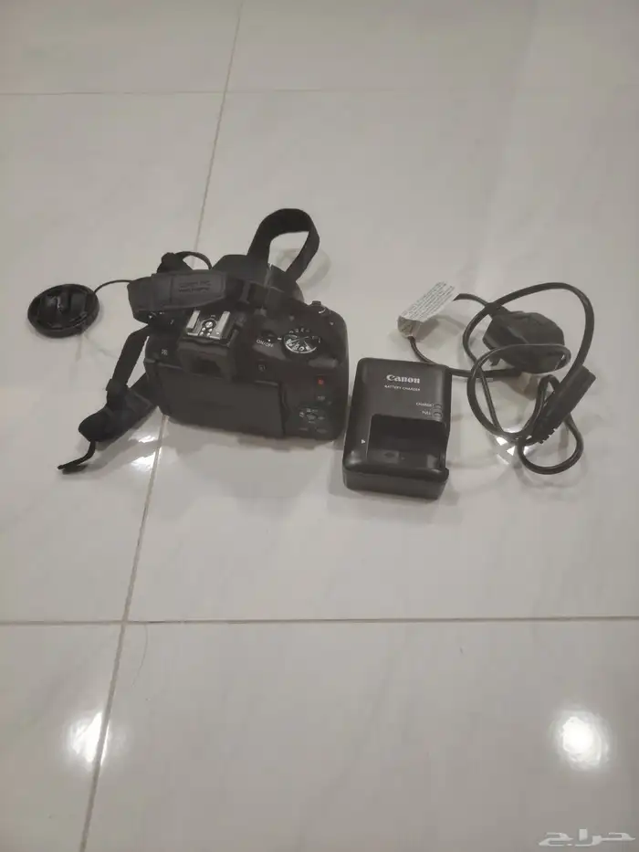 كاميرا تصوير احترافية من نوع كانون بكامل ملحقاتها مع شنطة 0