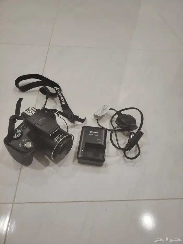 كاميرا تصوير احترافية من نوع كانون بكامل ملحقاتها مع شنطة 3