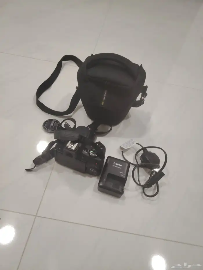 كاميرا تصوير احترافية من نوع كانون بكامل ملحقاتها مع شنطة 1