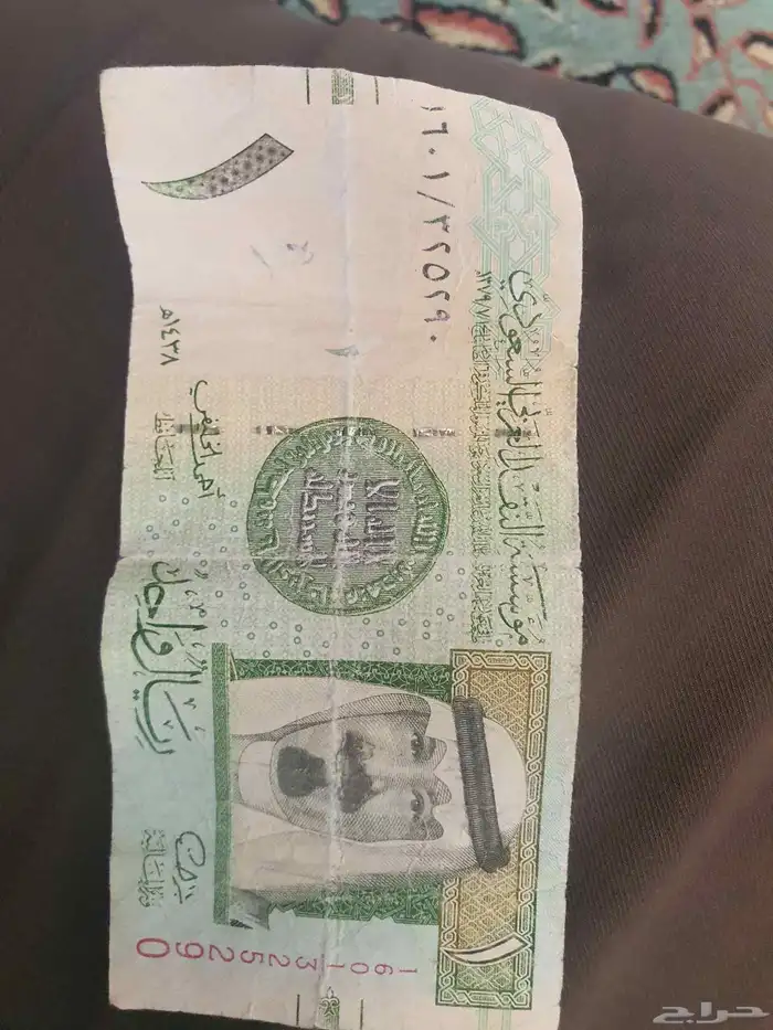 ريال توقيع احمد الخليفي ويوجد لدي عملات قديمه 4