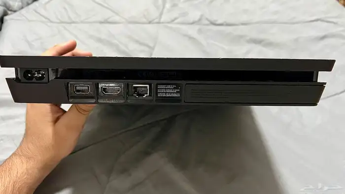 PlayStation 4 slim in excellent condition with 11 cds new 4