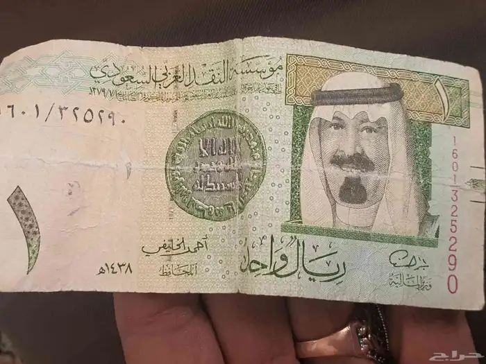 ريال توقيع احمد الخليفي ويوجد لدي عملات قديمه 0