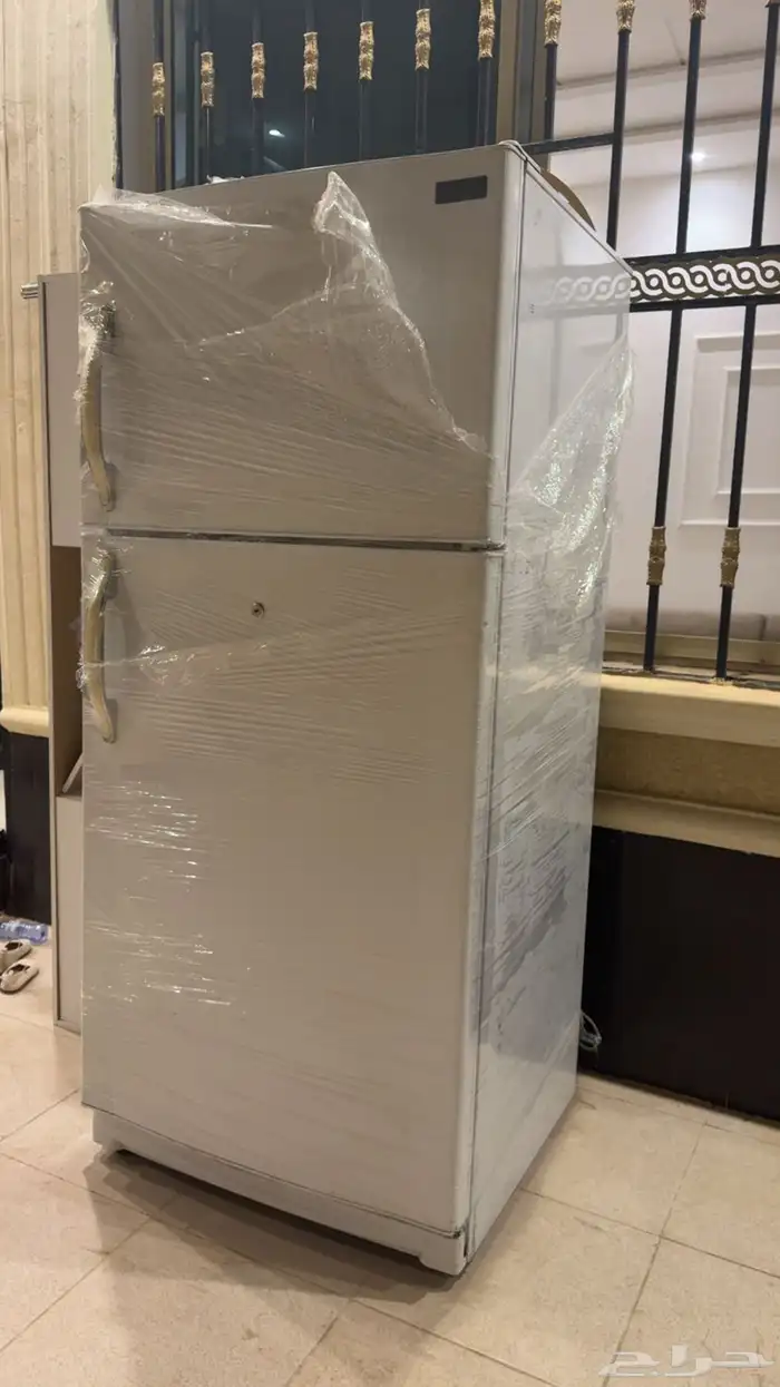 ثلاجة بيسك و غسالة دايو 13كيلو للبيع 0