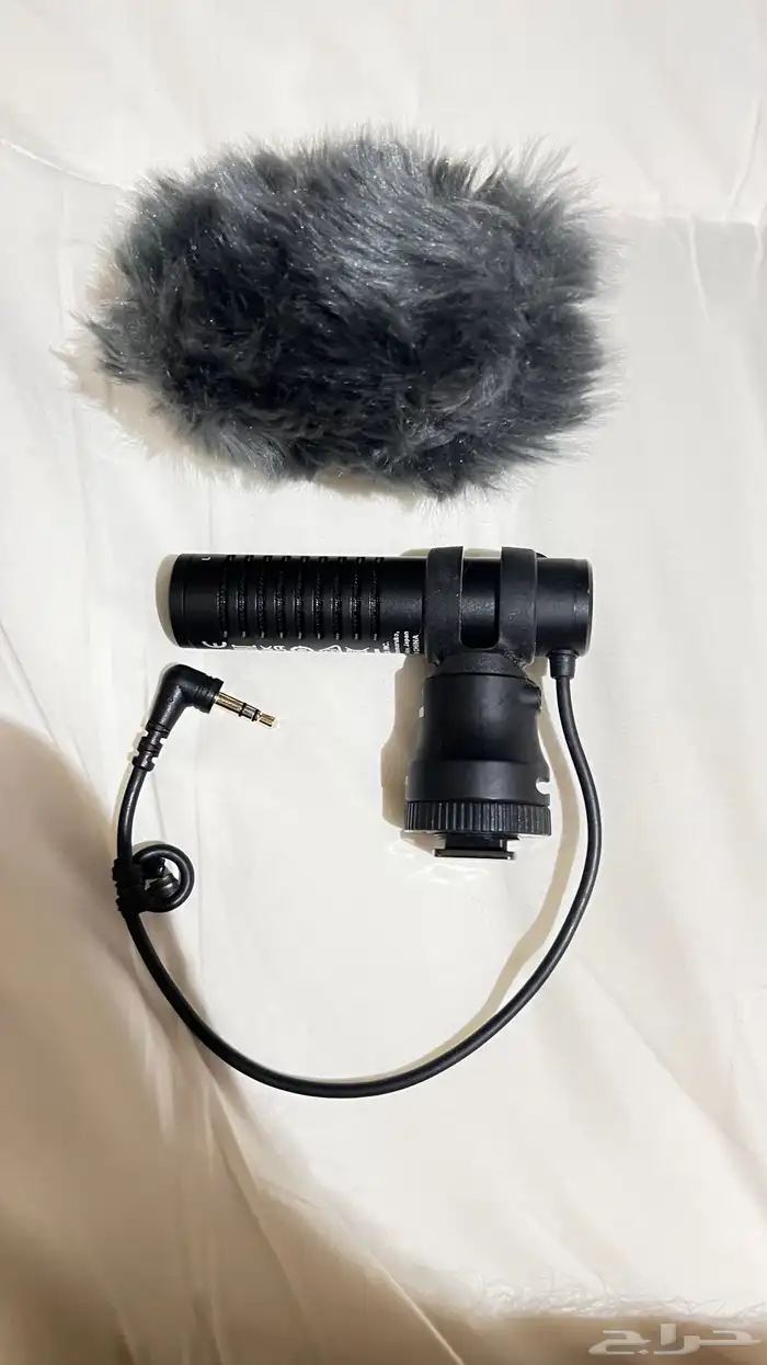 مايك كانون DM-E100 و ترايبود HG-100TBR 1