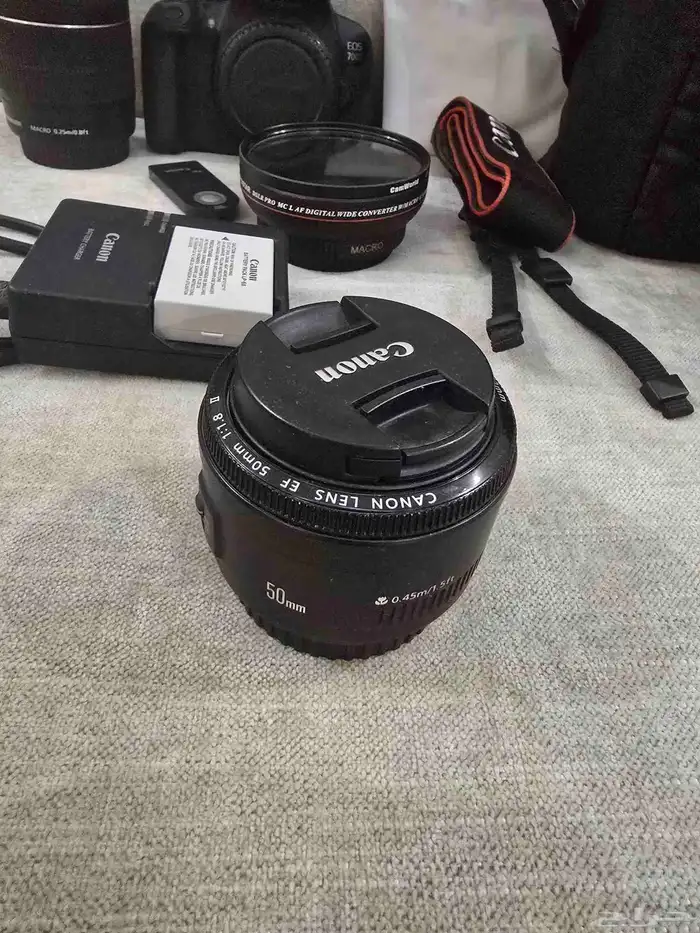 كاميرا كانون 700D مع فلاش خارجي و3 عدسات 1
