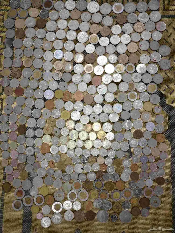 عملات معدنية أجنبية مشكله عددها 450 0