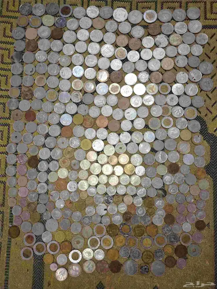 عملات معدنية أجنبية مشكله عددها 450 3