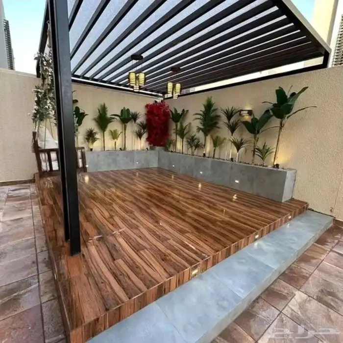 تنسيق حدائق القصيم جلسات خارجيه شلالات غرف زجاجية عشب طبيعي 2