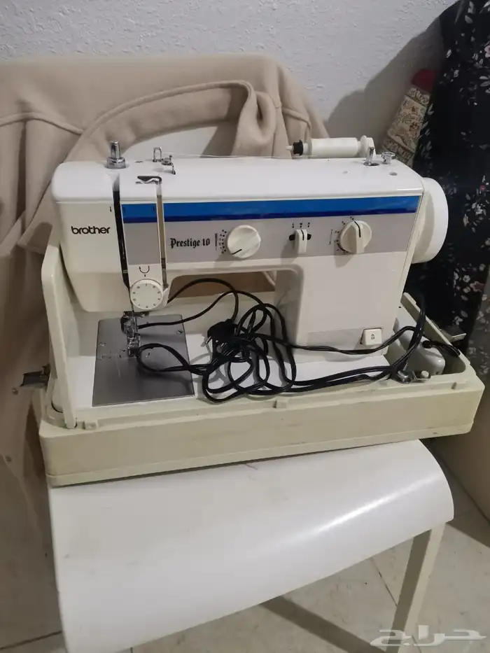 مكينة خياطة 0