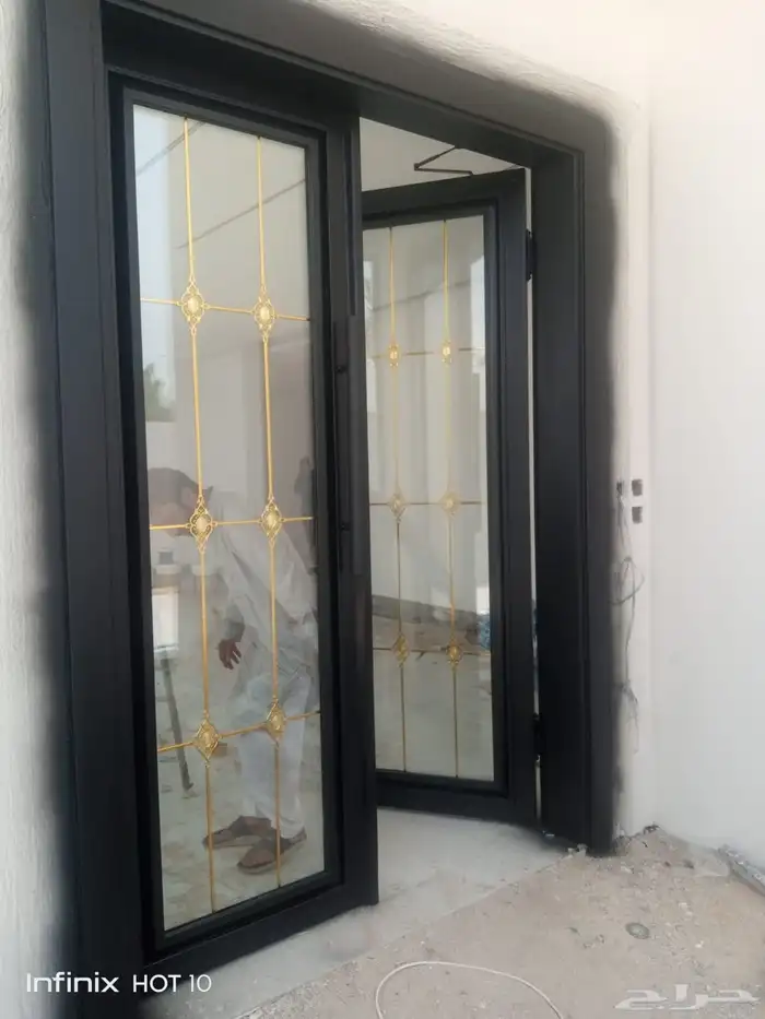 ابواب حديد ابواب كلادينج ابواب المنيوم سواتر مظلات هناجر 2