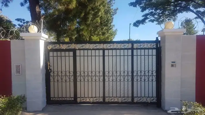 ابواب حديد ابواب كلادينج ابواب المنيوم سواتر مظلات هناجر 5