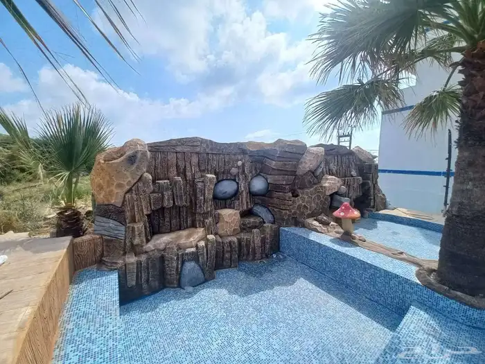 ديكورات خارجيه شلالات وتنسيق حدايق 2