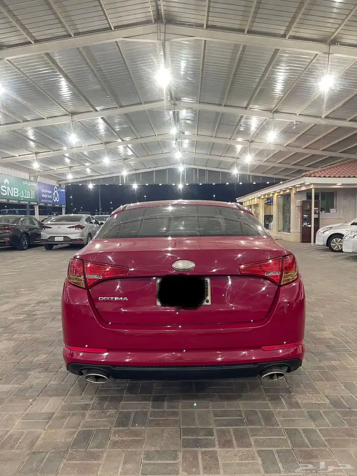 كيا أوبتيما موديل 2013 نص فل احمر دم غزال 3