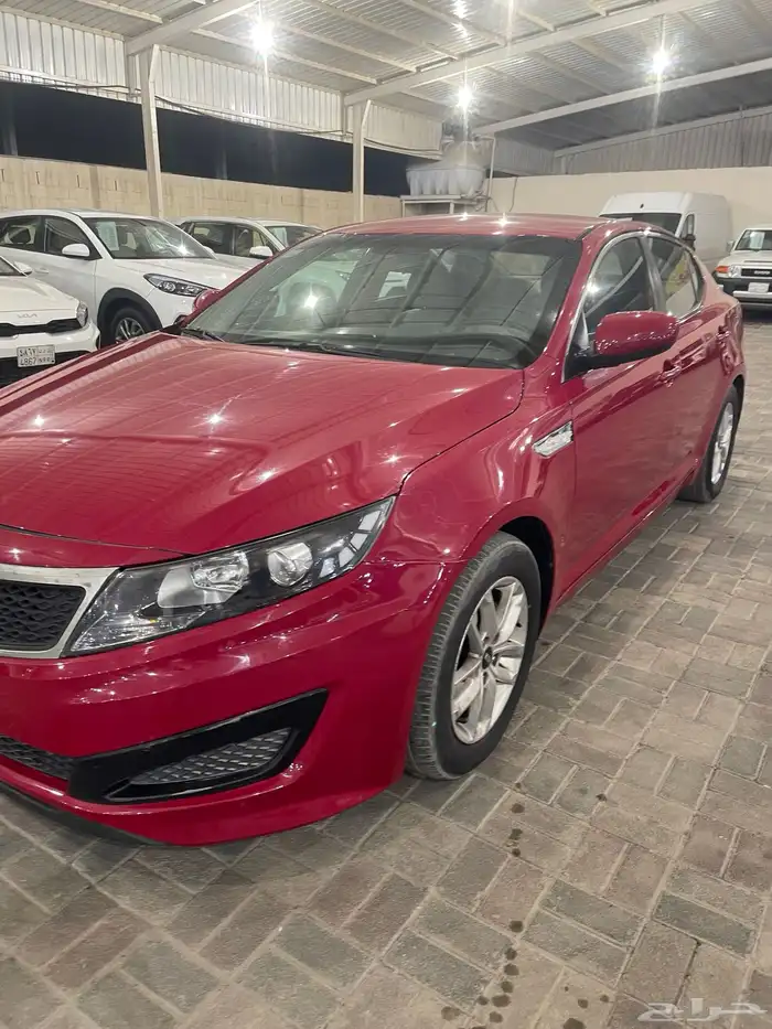 كيا أوبتيما موديل 2013 نص فل احمر دم غزال 1