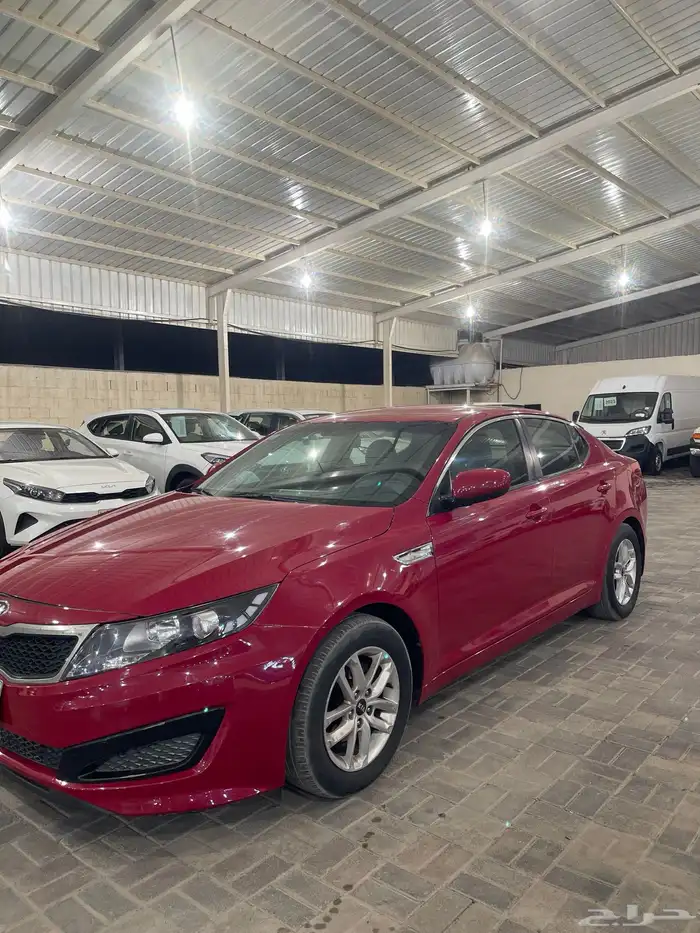 كيا أوبتيما موديل 2013 نص فل احمر دم غزال 2