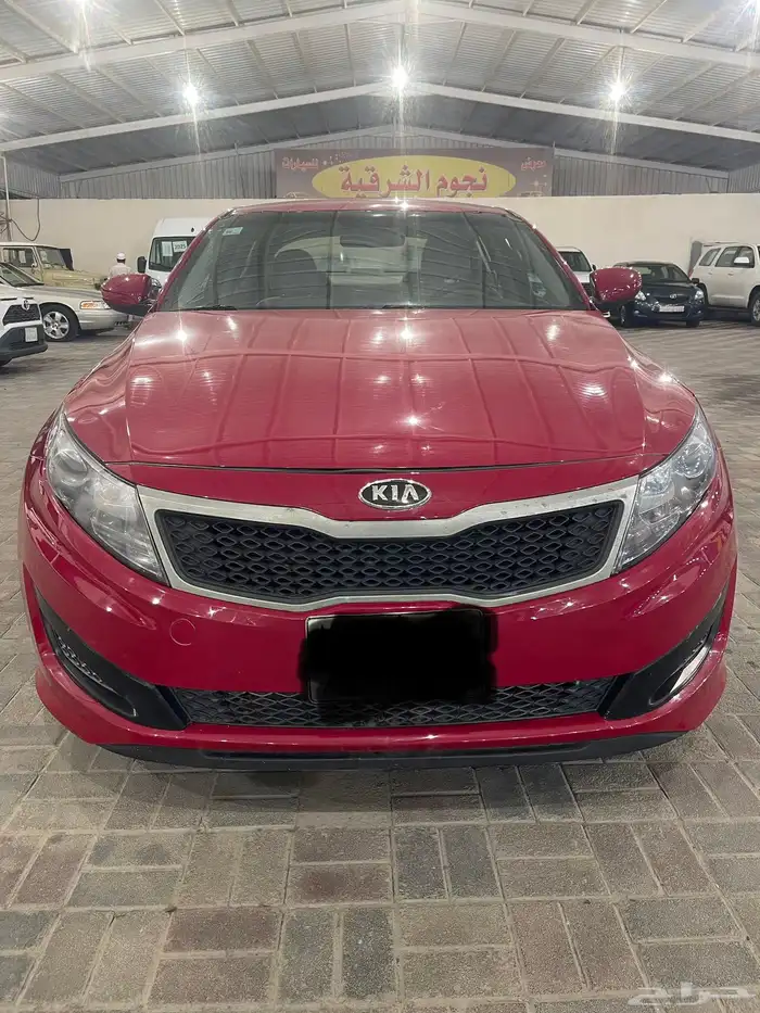 كيا أوبتيما موديل 2013 نص فل احمر دم غزال 6